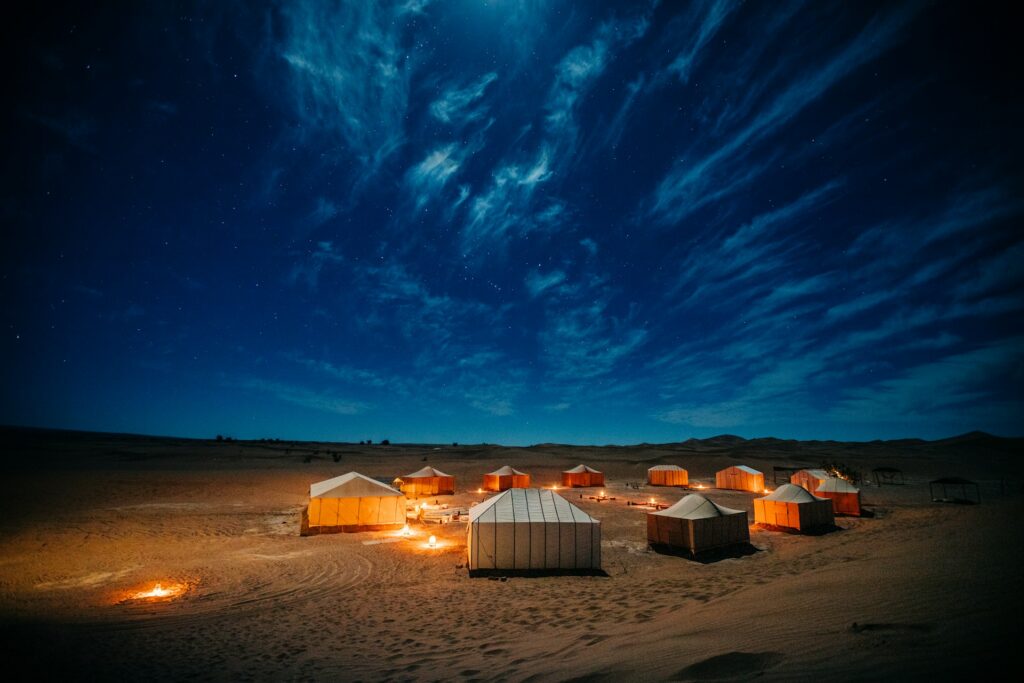 Luxury desert camp in Merzouga at night